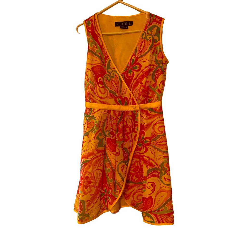 KOEL size 6 wrap dress. 38” long Buttons on inside and outside.